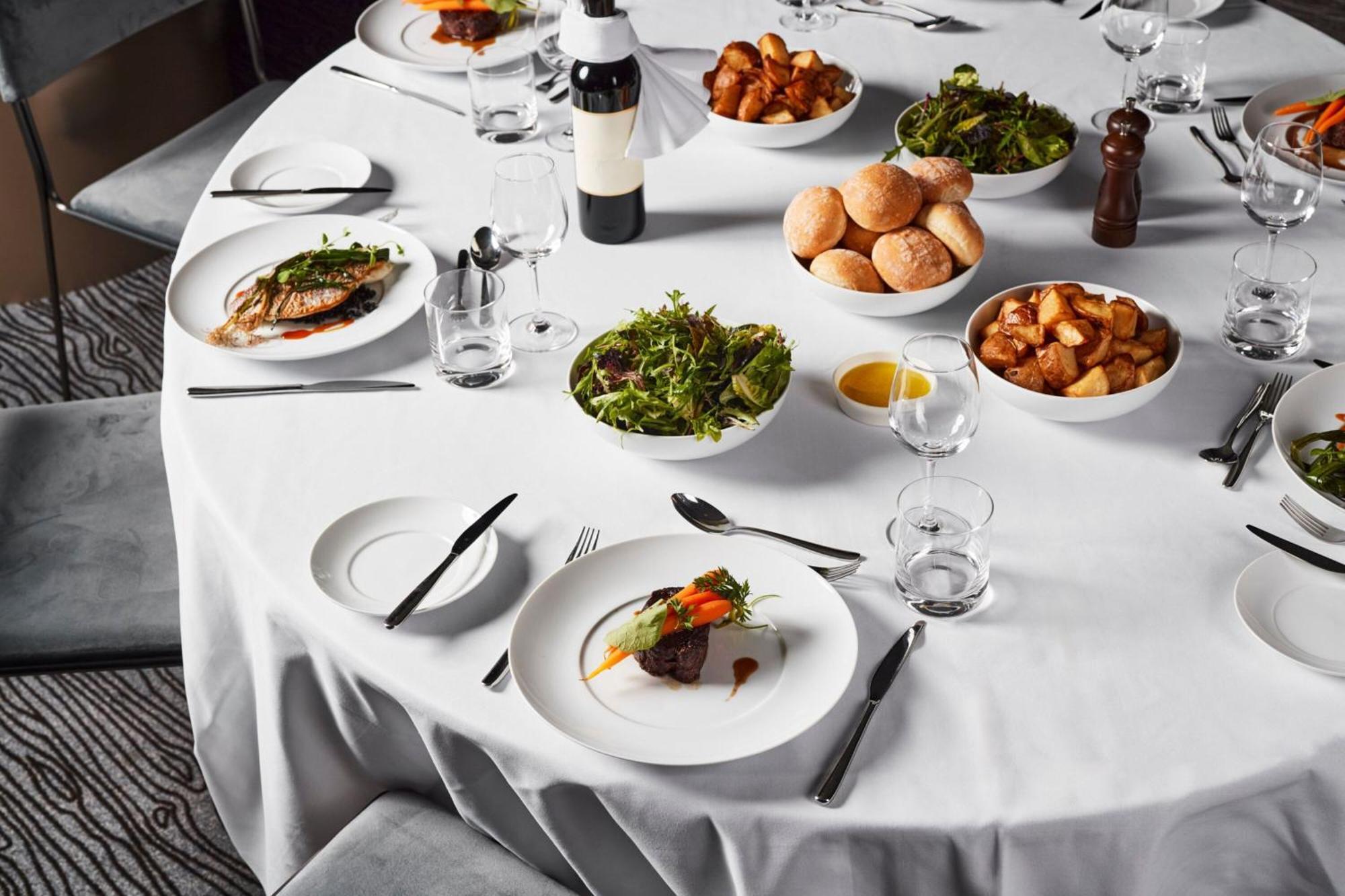 Melbourne Marriott Hotel Docklands Ngoại thất bức ảnh A table set for a formal dinner